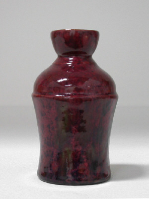Artist: George Ohr, Title: Bottle-Shaped Vase, c. 1900 - click for larger image
