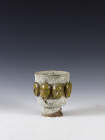 Beatrice Wood - Lava Glazed Footed Bowl with Ring of Gold Masks, c. 1994